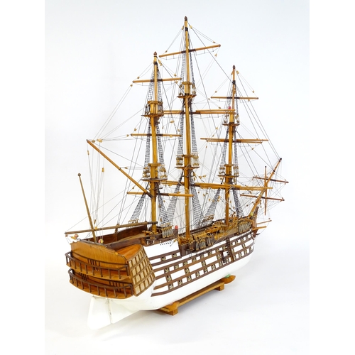 820 - A 20thC large scratch built scale model of a late 18thC war ship/ tall ship, with 74 guns over three... 