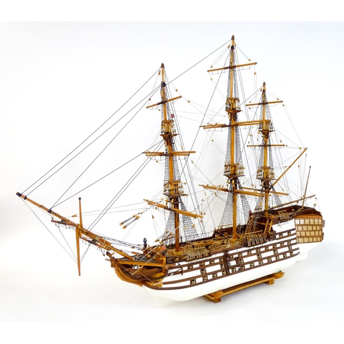 820 - A 20thC large scratch built scale model of a late 18thC war ship/ tall ship, with 74 guns over three... 