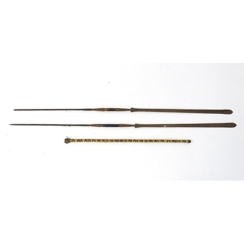 1048 - Ethnographic / Native / Tribal: Two African throwing spears, together with a bamboo walking stick wi... 