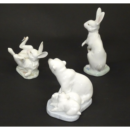 131 - Three Lladro models of animals comprising Hippity Hop rabbit, no. 5886; That Tickles rabbit, no. 588... 