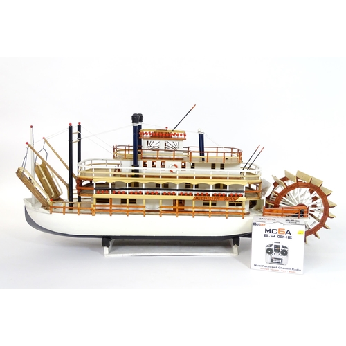 819 - A 20thC scratch built scale model of a 19thC paddle steamer boat , ' Mississippi Swan' , of wooden c... 