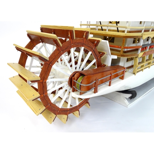 819 - A 20thC scratch built scale model of a 19thC paddle steamer boat , ' Mississippi Swan' , of wooden c... 