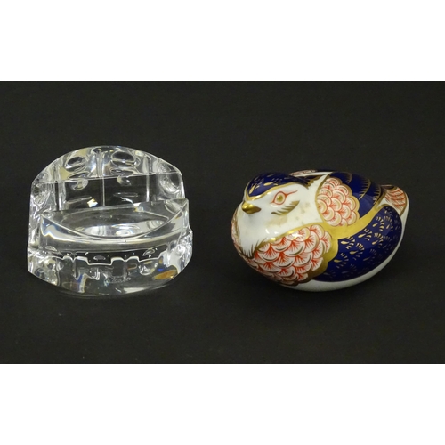 117 - A Derby paperweight modelled as a quail. Marked under. Together with a Baccarat glass stand in the E... 