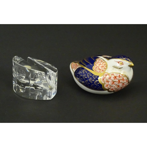 117 - A Derby paperweight modelled as a quail. Marked under. Together with a Baccarat glass stand in the E... 