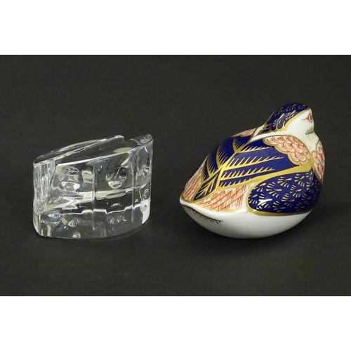 117 - A Derby paperweight modelled as a quail. Marked under. Together with a Baccarat glass stand in the E... 