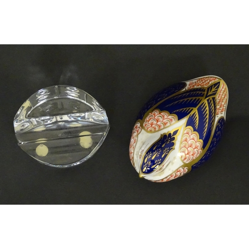 117 - A Derby paperweight modelled as a quail. Marked under. Together with a Baccarat glass stand in the E... 