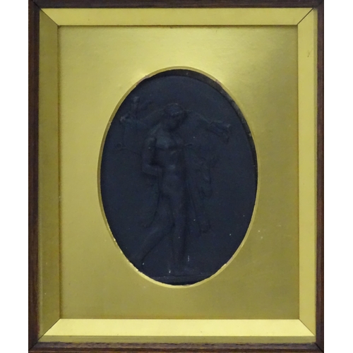 122 - A 19thC Wedgwood black basalt oval plaque depicting a classical scene with Hercules carrying the Ery... 