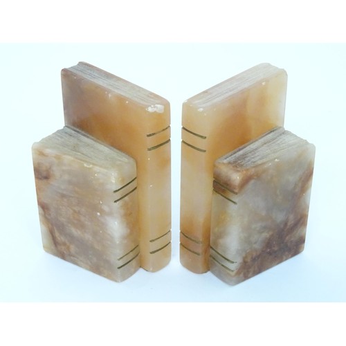 27 - A pair of alabaster bookends formed as books, each approx 6