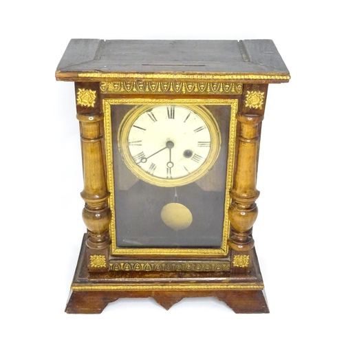 144 - A mantel clock with white enamel dial having Roman numerals and winding hole at four.