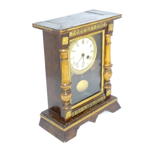 144 - A mantel clock with white enamel dial having Roman numerals and winding hole at four.