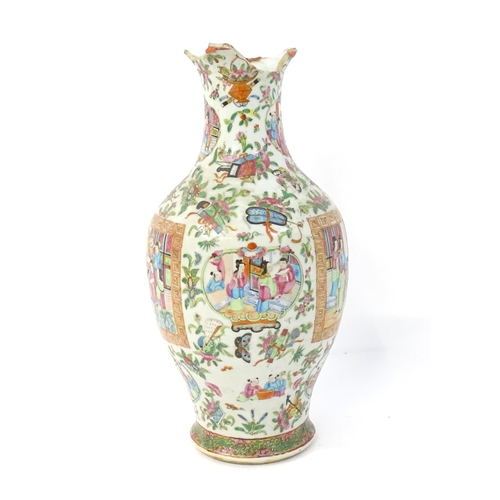 150 - A Chinese famille rose vase decorated with figures, flowers, scrolls, butterflies, etc. Approx. 17 1... 