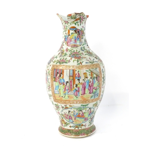 150 - A Chinese famille rose vase decorated with figures, flowers, scrolls, butterflies, etc. Approx. 17 1... 