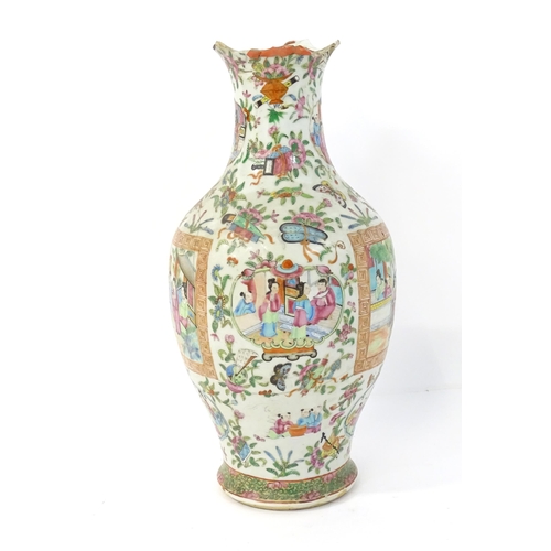 150 - A Chinese famille rose vase decorated with figures, flowers, scrolls, butterflies, etc. Approx. 17 1... 