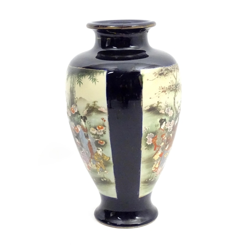 153 - A Japanese vase decorated with figures in a landscape with mountains, flowers, etc. Marked under. Ap... 