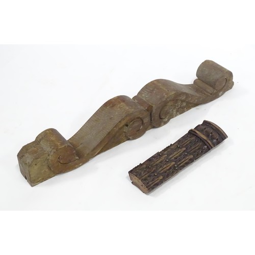 9 - Two carved wooden items one appearing to be a scrolled pediment together with a carved section with ... 