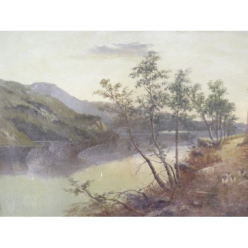 223 - A 19thC Scottish oil on board depicting a loch scene with sheep, titled verso Craig Angus lane on Lo... 