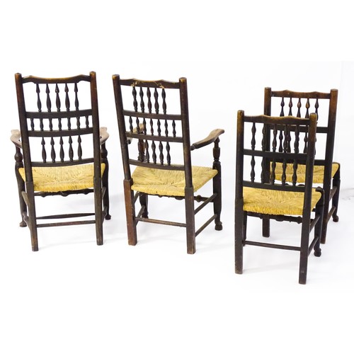 229 - A group of four (2+2) 19thC spindle back chairs with envelope rush seats. 23