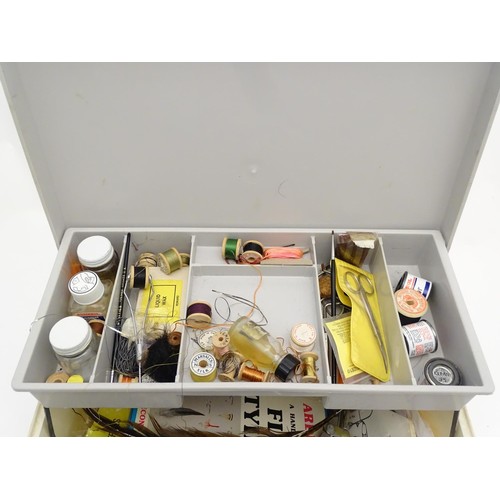 239 - Fishing / Fly Tying : An equipment box containing a quantity of fly fisherman's items to include a f... 