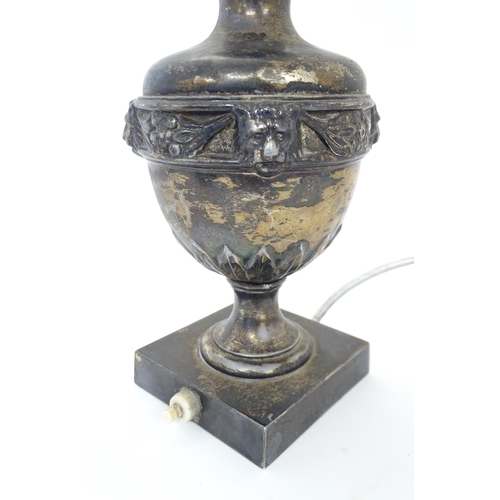 240 - Three assorted table lamps to include one of urn form with silver plate decoration, etc. Largest app... 