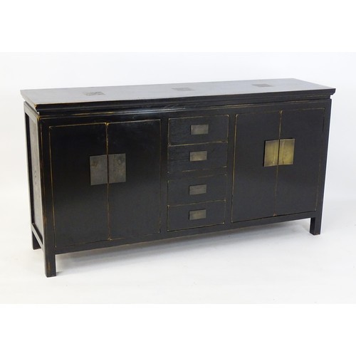 322 - Japanese Dining suite : A black suite with lacquered finish having engraved brass panel decoration. ... 