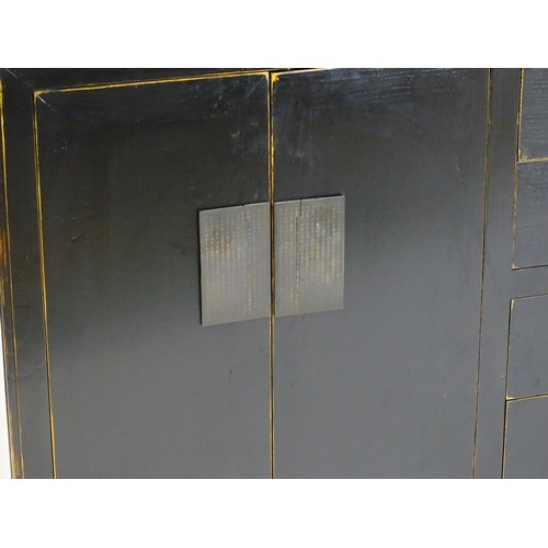 322 - Japanese Dining suite : A black suite with lacquered finish having engraved brass panel decoration. ... 