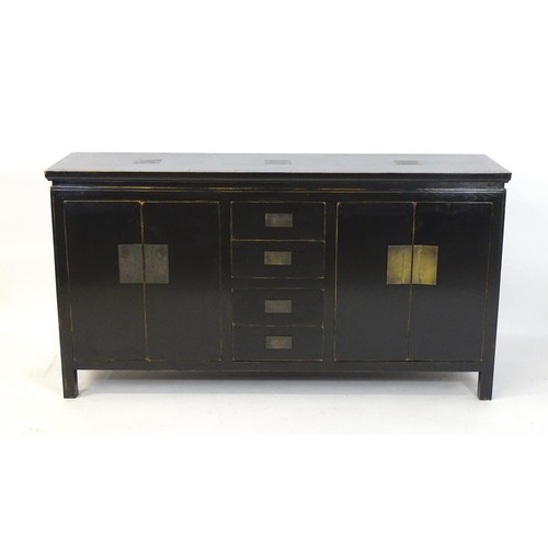 322 - Japanese Dining suite : A black suite with lacquered finish having engraved brass panel decoration. ... 