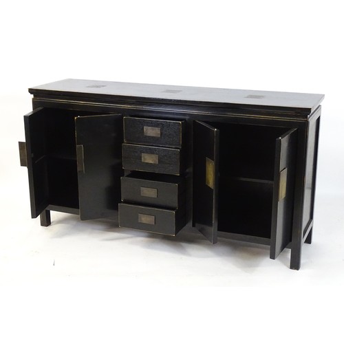 322 - Japanese Dining suite : A black suite with lacquered finish having engraved brass panel decoration. ... 