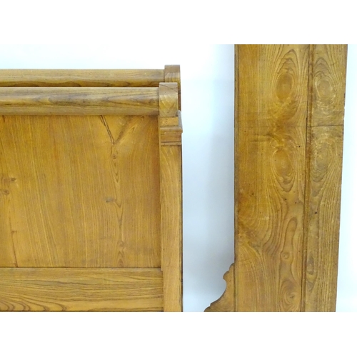 339 - A late 19thC / early 20thC elm sleigh bed. 48