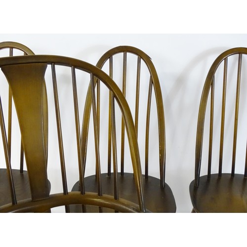 348 - Six late 20thC Ercol dining chairs (5+1) bearing a label to the underside of the seat. 26