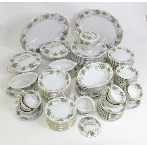 357 - A quantity of Noritake dinner wares in the pattern Daphne, to include serving dishes, plates, lidded... 