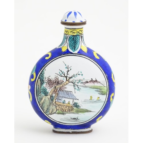 388 - An Oriental snuff bottle with hand painted landscape decoration. Approx.. 2 1/2