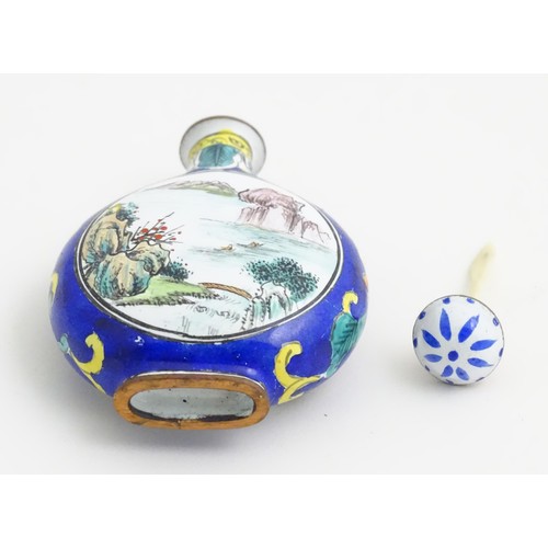 388 - An Oriental snuff bottle with hand painted landscape decoration. Approx.. 2 1/2