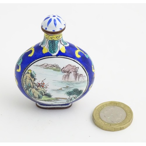 388 - An Oriental snuff bottle with hand painted landscape decoration. Approx.. 2 1/2