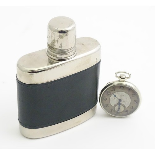 389 - A Longines pocket watch. Together with a hip flask (2)