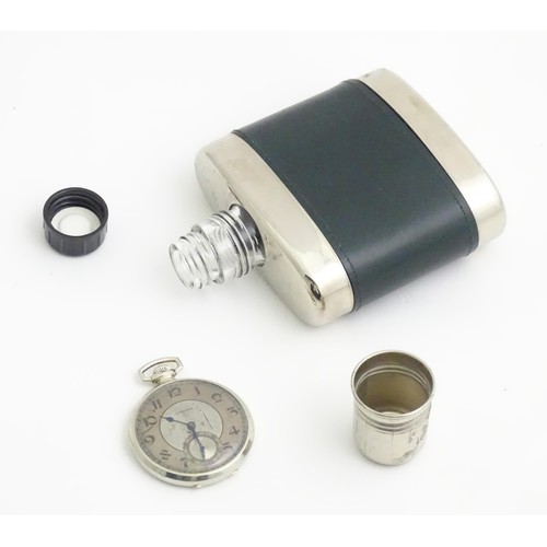 389 - A Longines pocket watch. Together with a hip flask (2)
