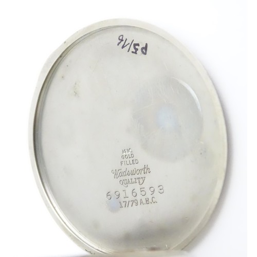 389 - A Longines pocket watch. Together with a hip flask (2)