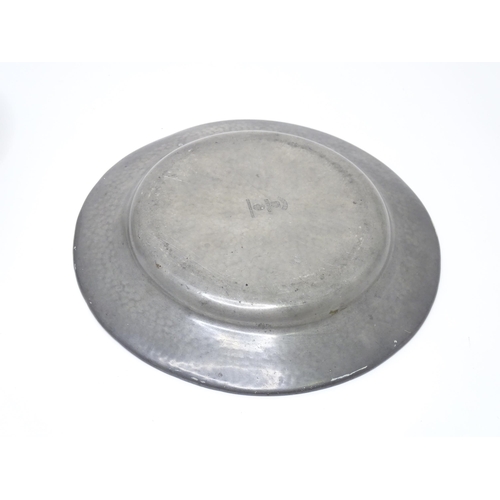 399 - Two items of Arts & Crafts style pewter wares with hammered decoration to include a twin handled sug... 