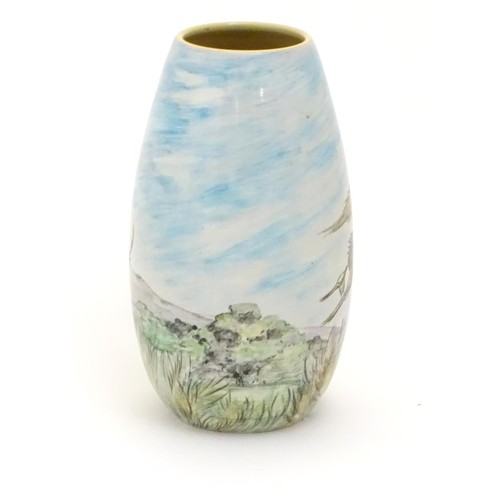 403 - A Branksome vase of ovoid form with hand painted decoration depicting a landscape scene with a stag ... 