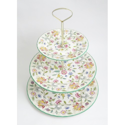 404 - A Minton three tier cake stand in the Haddon Hall pattern. Approx. 13 1/2