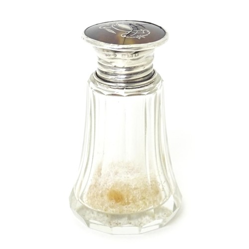 410 - A glass salts / scents bottle, the silver and tortoiseshell lid with pique work decoration, hallmark... 