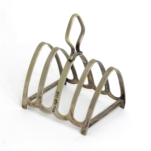 413 - A silver plate five bar toast rack by Boots Pure Drug Company