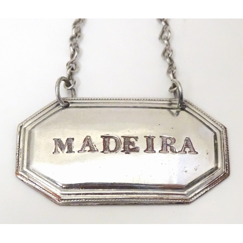 416 - A 19thC Old Sheffield plate wine / decanter label / bottle ticket, 'Madeira'. Approx. 1 3/4