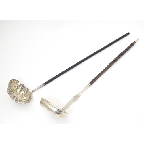 417 - Two late 18th / early 19thC silver and white metal toddy ladles, one with whale bone twist handle , ... 