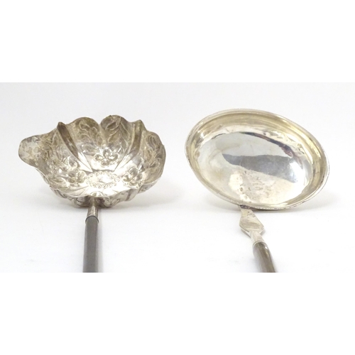 417 - Two late 18th / early 19thC silver and white metal toddy ladles, one with whale bone twist handle , ... 