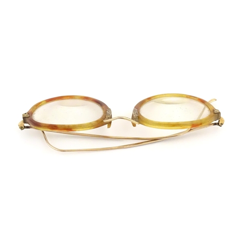 464 - A cased pair of c1940s bifocal spectacles / glasses, with faux tortoiseshell and gilt metal frames, ... 