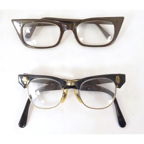 466 - Four pairs of mid 20thC spectacles / glasses, the largest 5 1/4