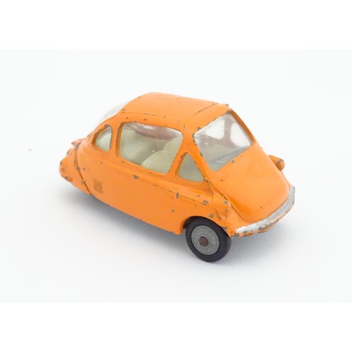 474 - Toy: A Corgi Toys die cast scale model Heinkel Economy Car with orange body, no. 233