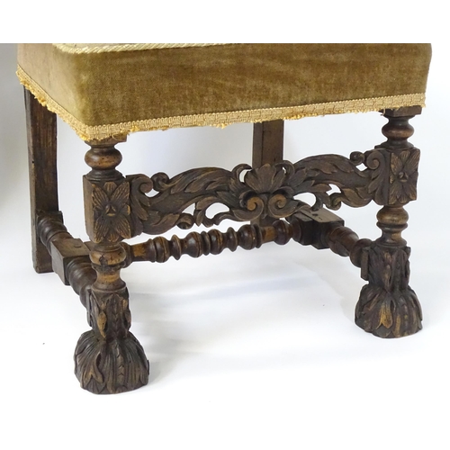 593 - A pair of late 19thC side chairs with rectangular backrests above sprung seats and carved oak legs w... 