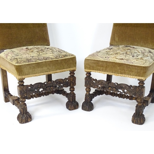 593 - A pair of late 19thC side chairs with rectangular backrests above sprung seats and carved oak legs w... 