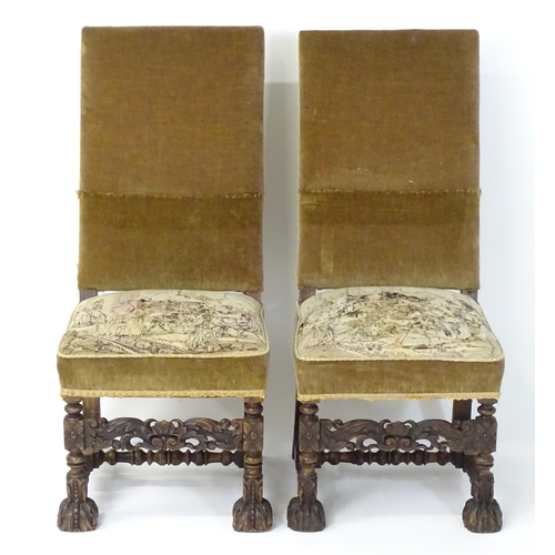 593 - A pair of late 19thC side chairs with rectangular backrests above sprung seats and carved oak legs w... 